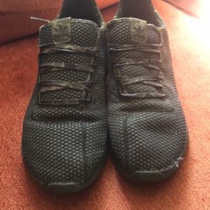 Adidas camo tennis shoes.